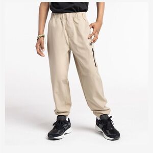 New Balance Beige Joggers with Black Accents. Kids Size 14/16. NEW.